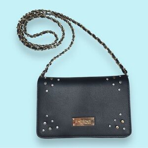 Vintage Bebe black crossbody bag with gold hardware and zip & button closure